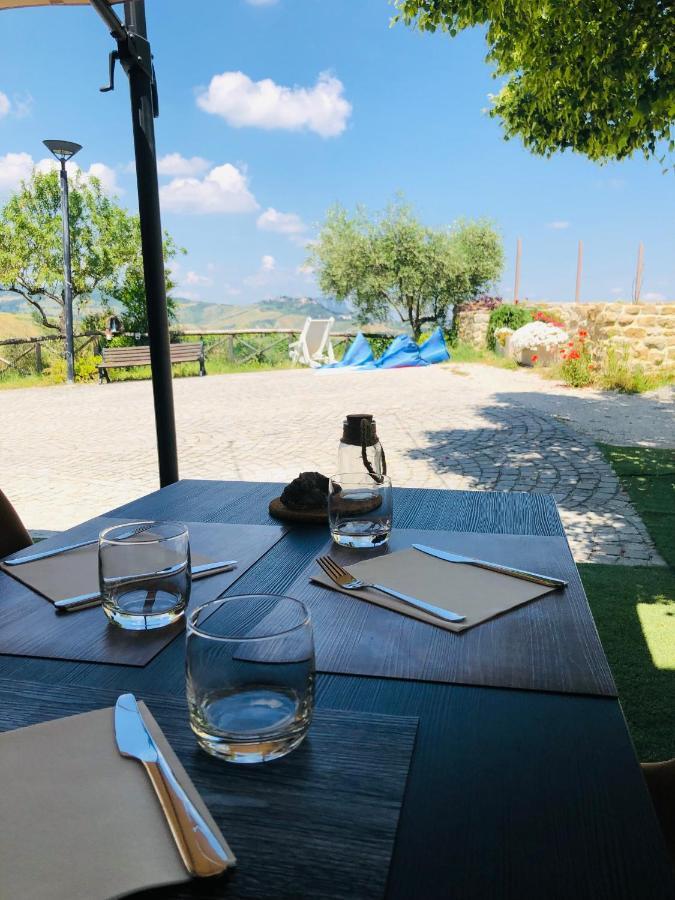ホテル Locanda Delle Grotte Di Onferno ジェンマーノ エクステリア 写真